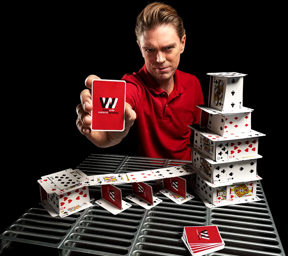 man holding playing card